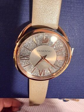 Swarovski Rose Gold Case with Champagne Strap Crystal Dial Women’s Watch